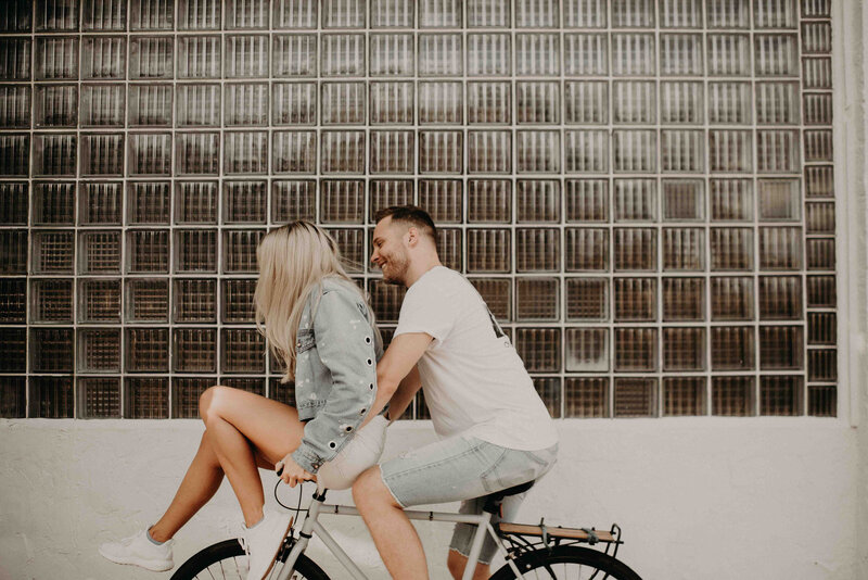 couple riding a bike together