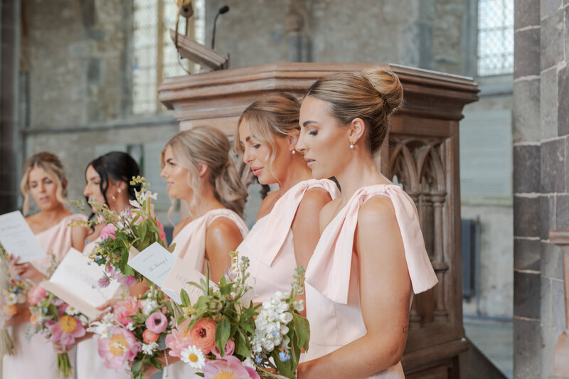Black + white photo of couples kissing on their wedding day at Oxwich Bay Hotel