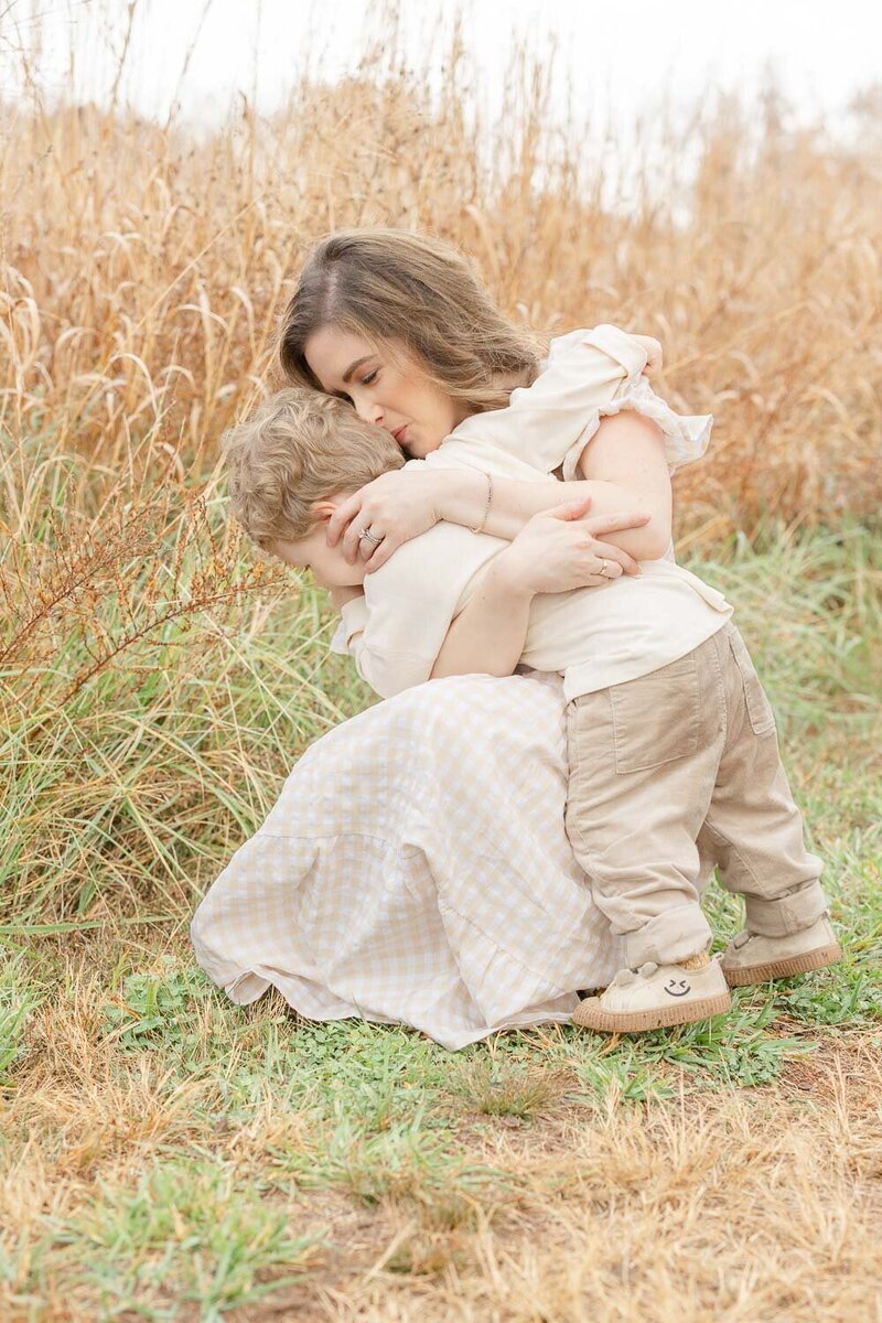 Mom hugging son during Manassas, VA photography
