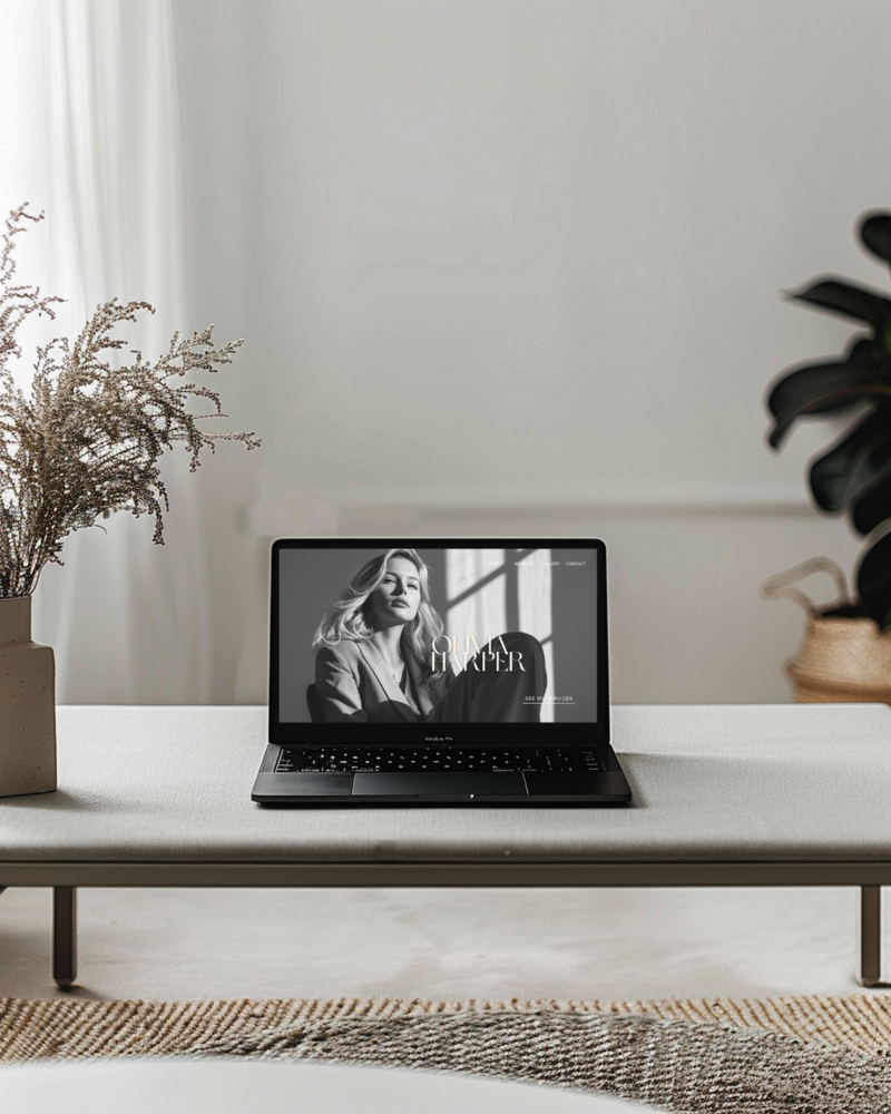 Laptop mockup showing Olivia Hunter custom Showit website design – created by Kathalyst Design Studio Website in a Week package