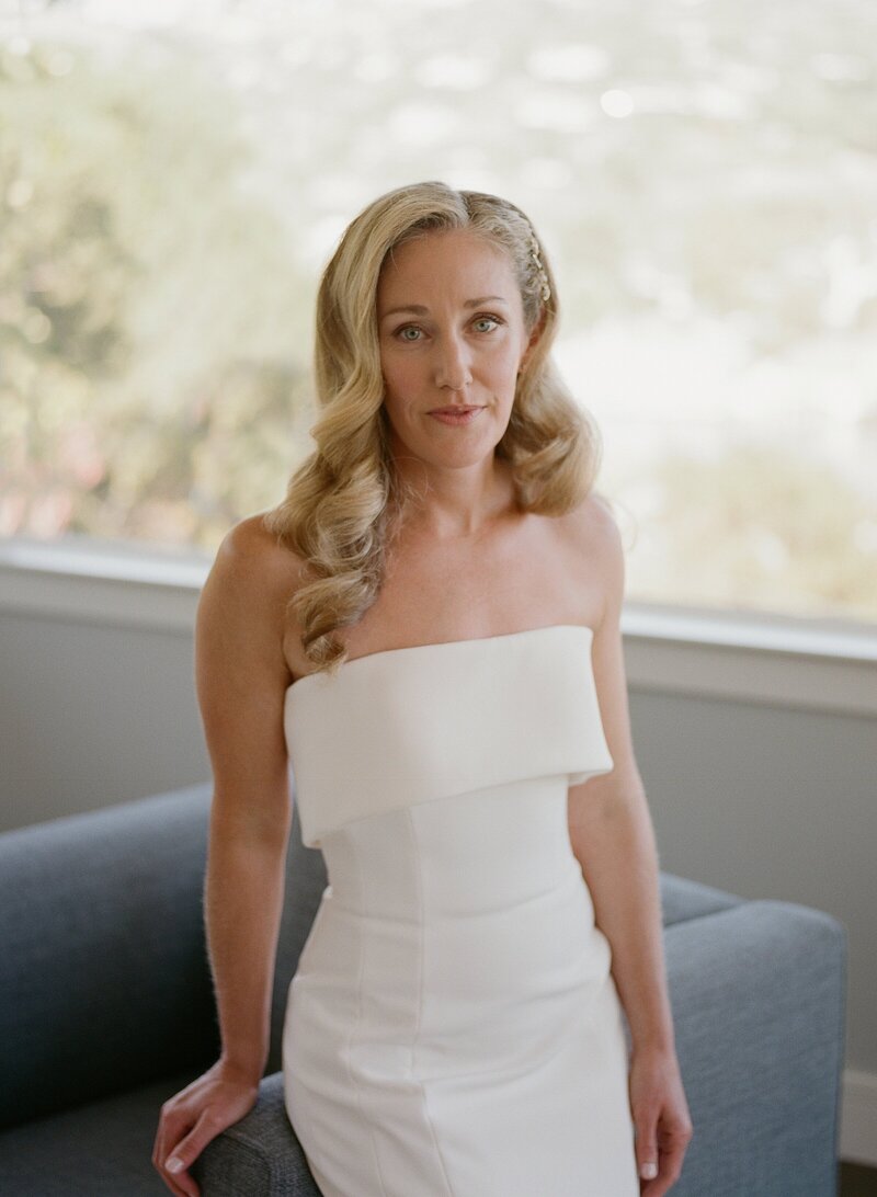 Loop flowers luxury wedding tablescape with yellow and pink florals with accents of burnt orange and slate blue