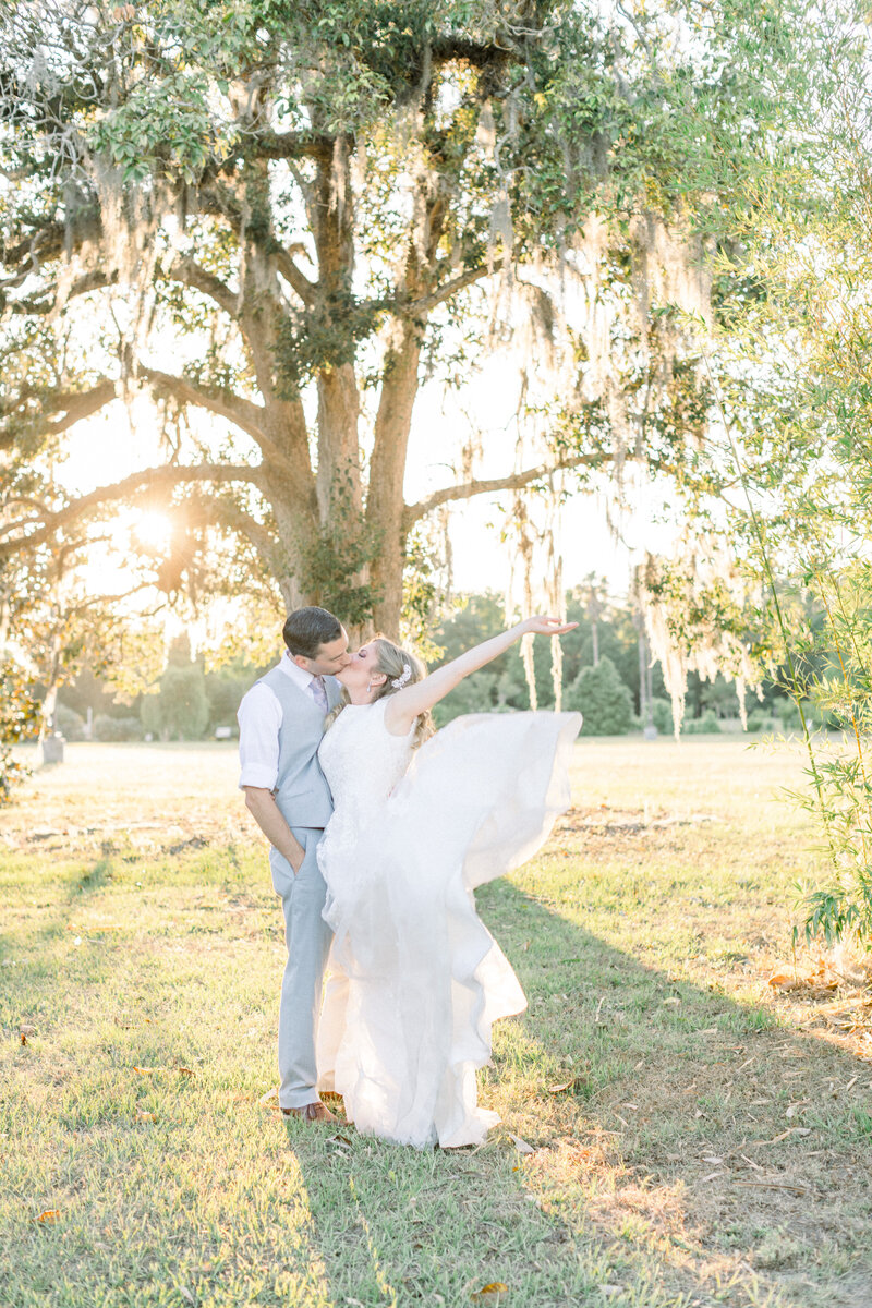 bride and groom wedding portraits at sunset
