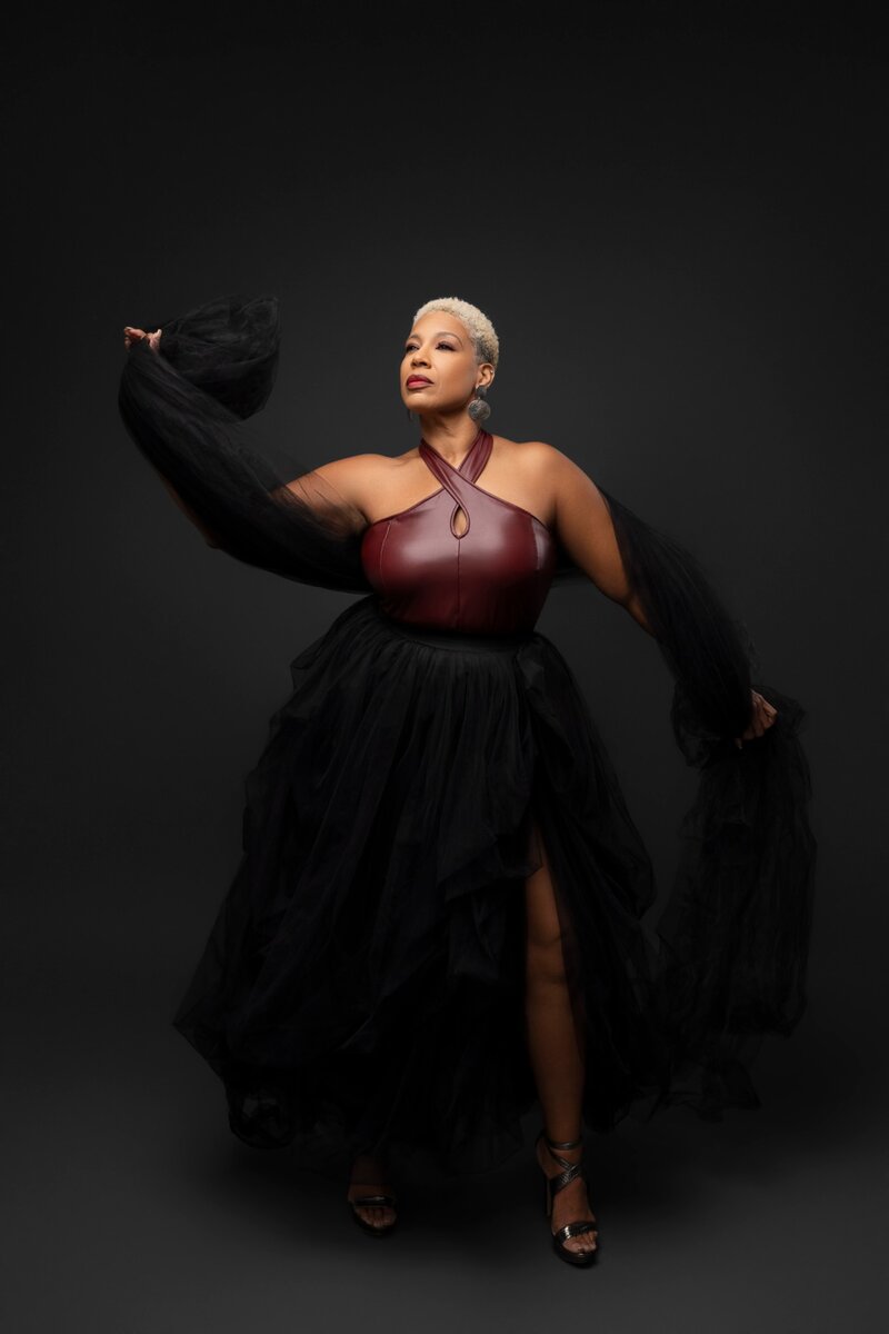 Professional photo of vibrant mature woman posing for camera