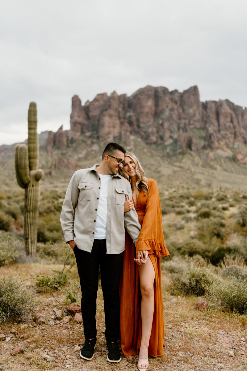 couple poses in arizona landscape
