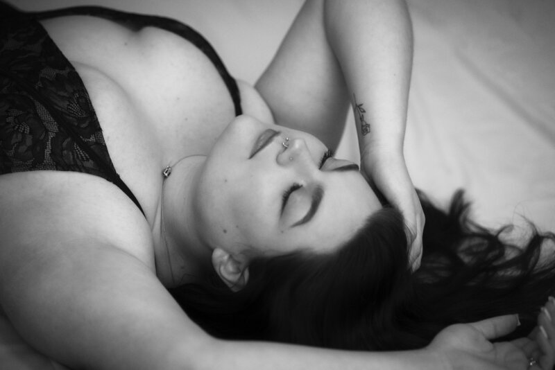 Colorado Springs Boudoir Photographer woman on floor in lingerie