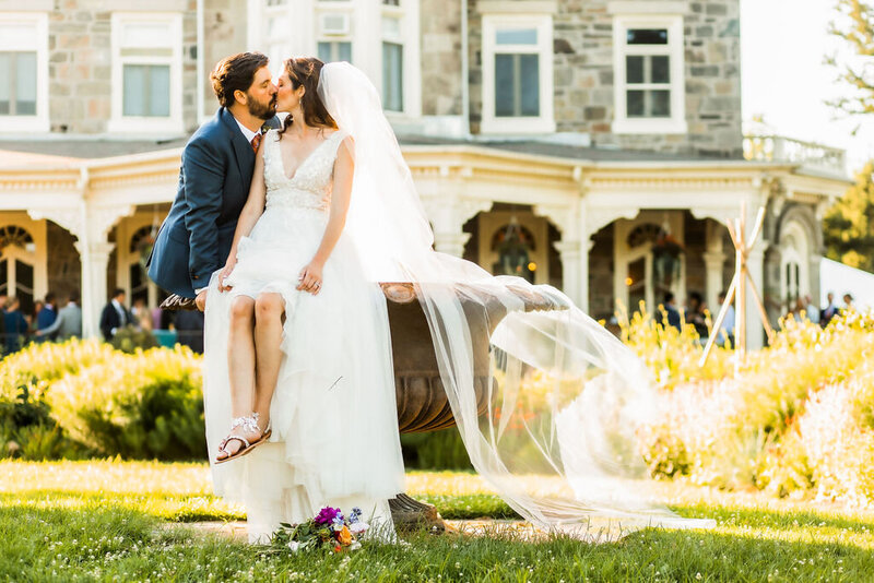 Cylburn Arboretum Wedding, Couple kisses on fountain