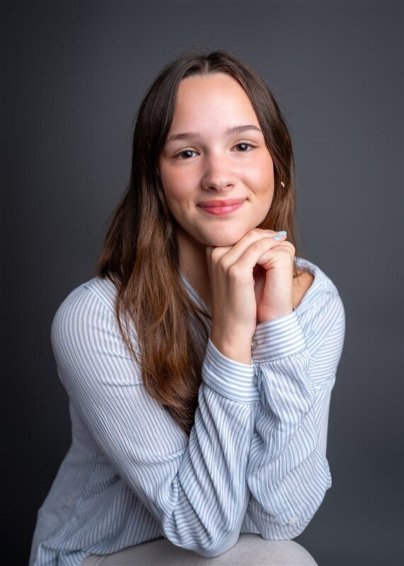 headshot of richelle winkler in white baltic born dress at the apiary in hartford ct