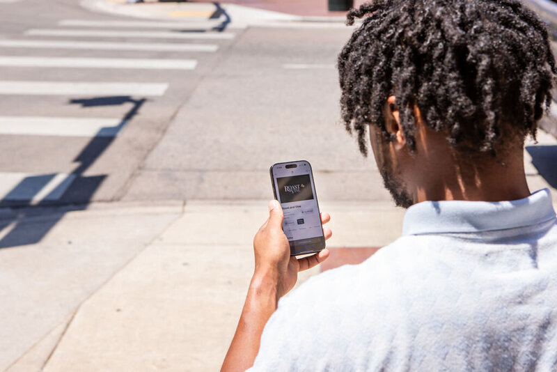 over the shoulder image of man ordering from phone