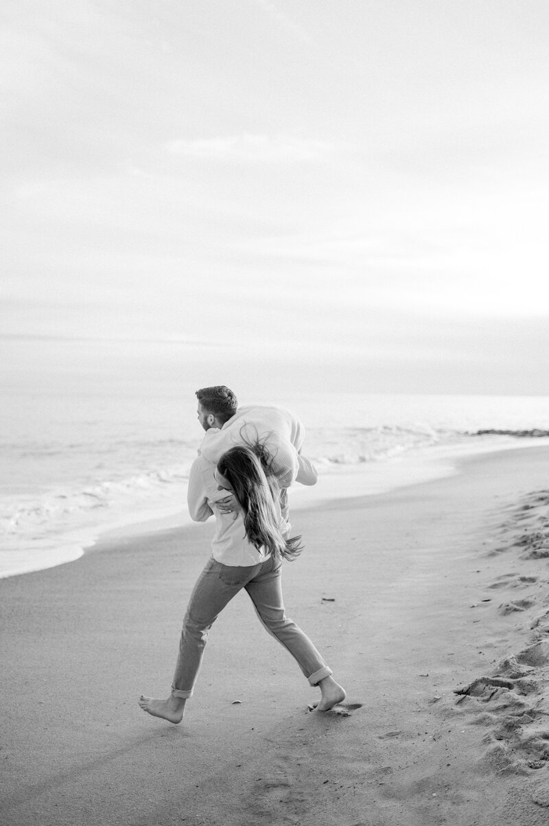 charleston family photographer holding matted prints\