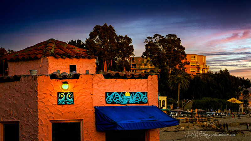 Warm glow of a Monterey Bay sunset cast on Venetian Hotel in Capitola Village, CA.