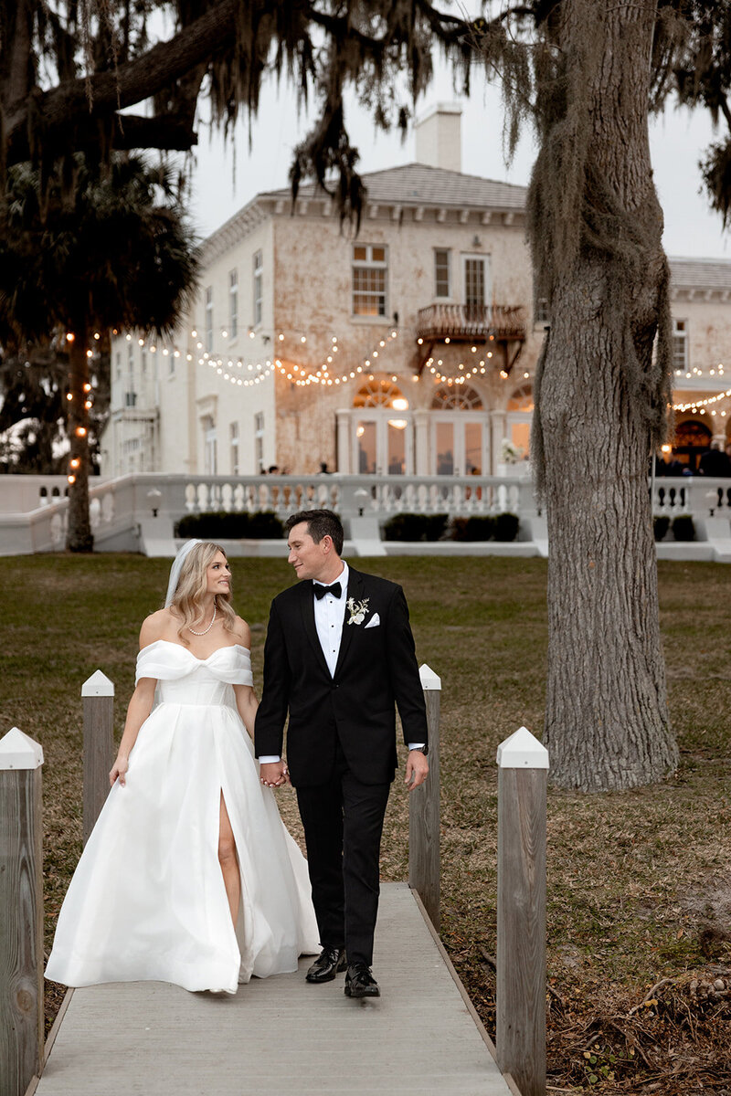 beautiful bride in front of the Howey mansion wedding venue