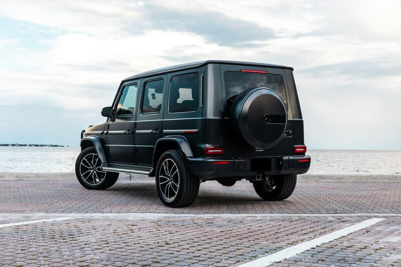 mercedes-g550-matte-manufaktur-night-black-magno-for-rent-in-miami-rear-quarter-view-025