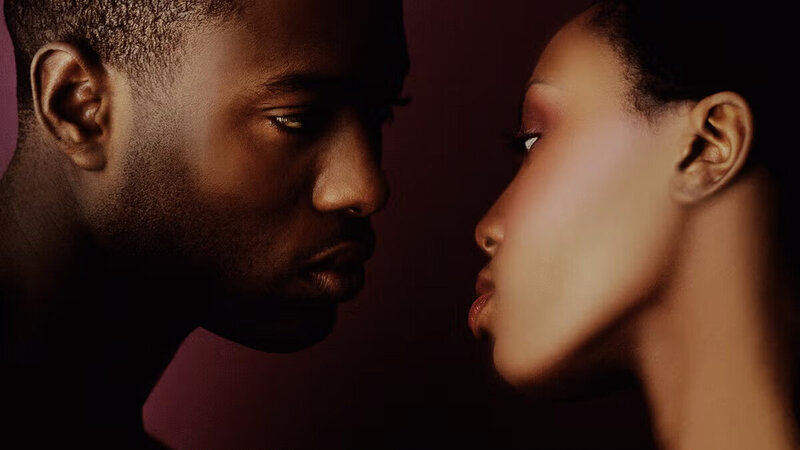 A man and woman gazing at each other, featured in a Cosmopolitan magazine article.