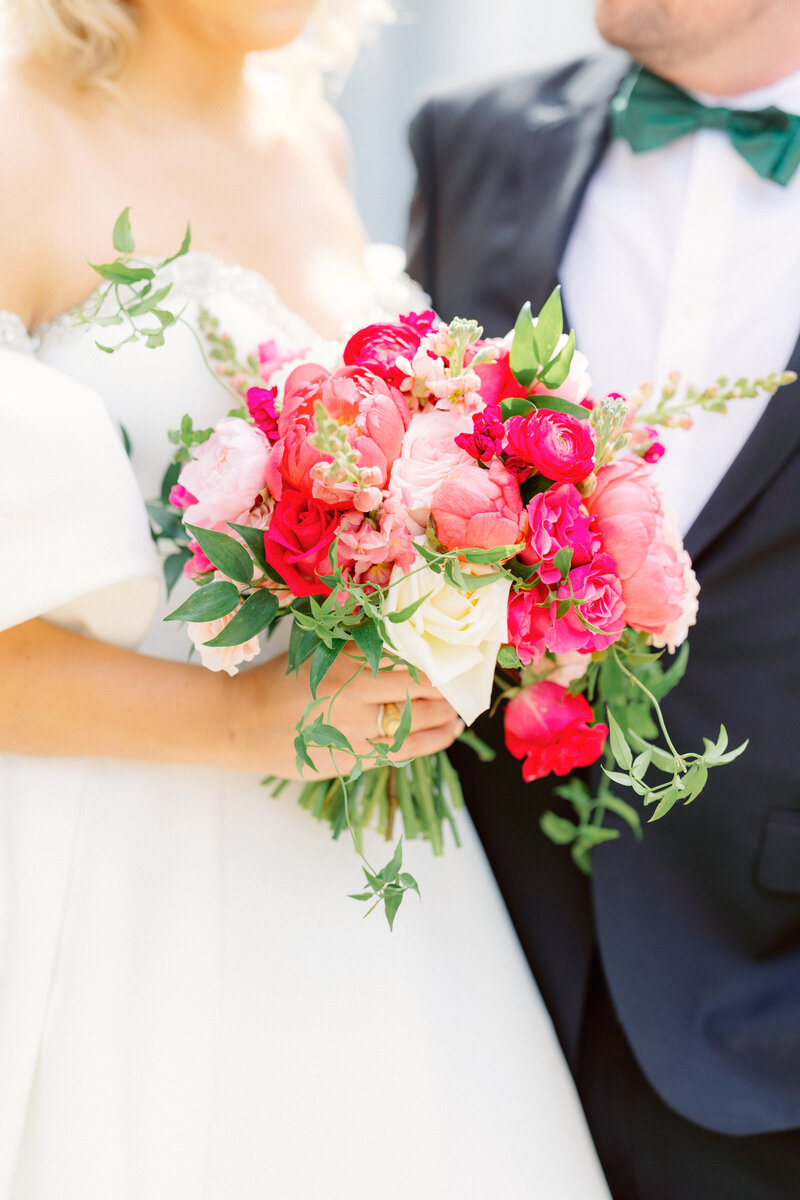 bride holding flowers