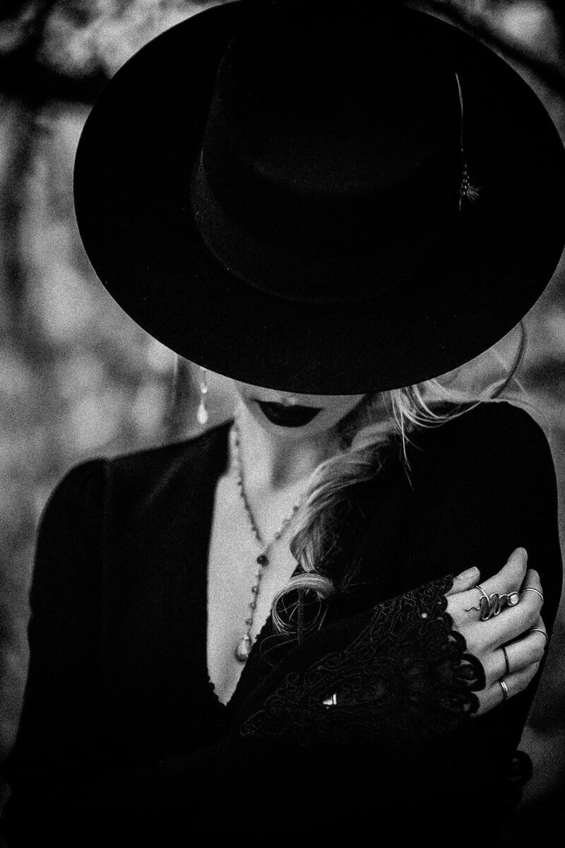 blonde gothic girl with black hat