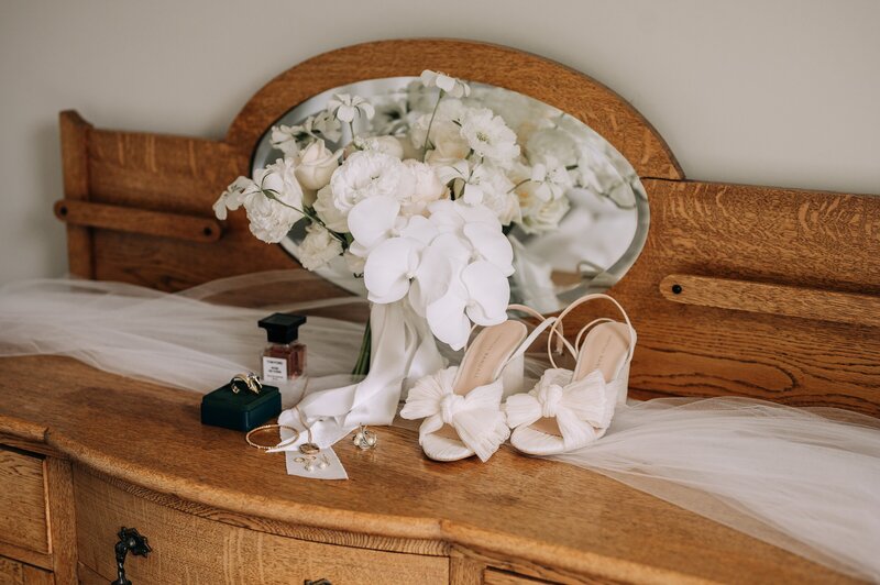 white wedding bouquet by the flower press christchurch with ivory loeffler randall heels wedding details