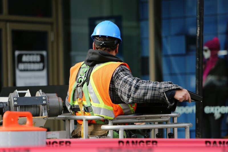 Frontline worker in PPE reducing safety incidents through leadership-driven cultural change