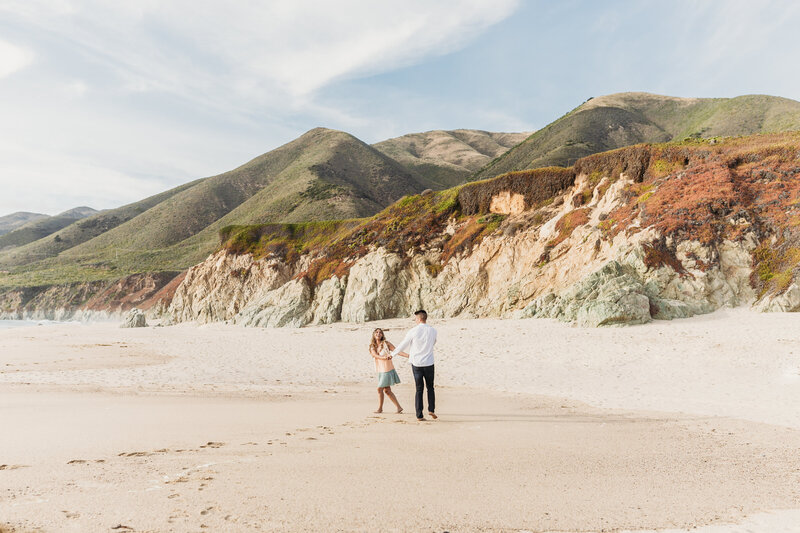 couple running on beach