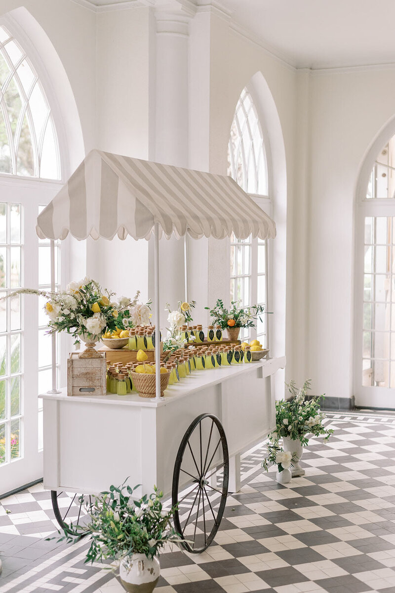 luxury wedding escort card display with lemons