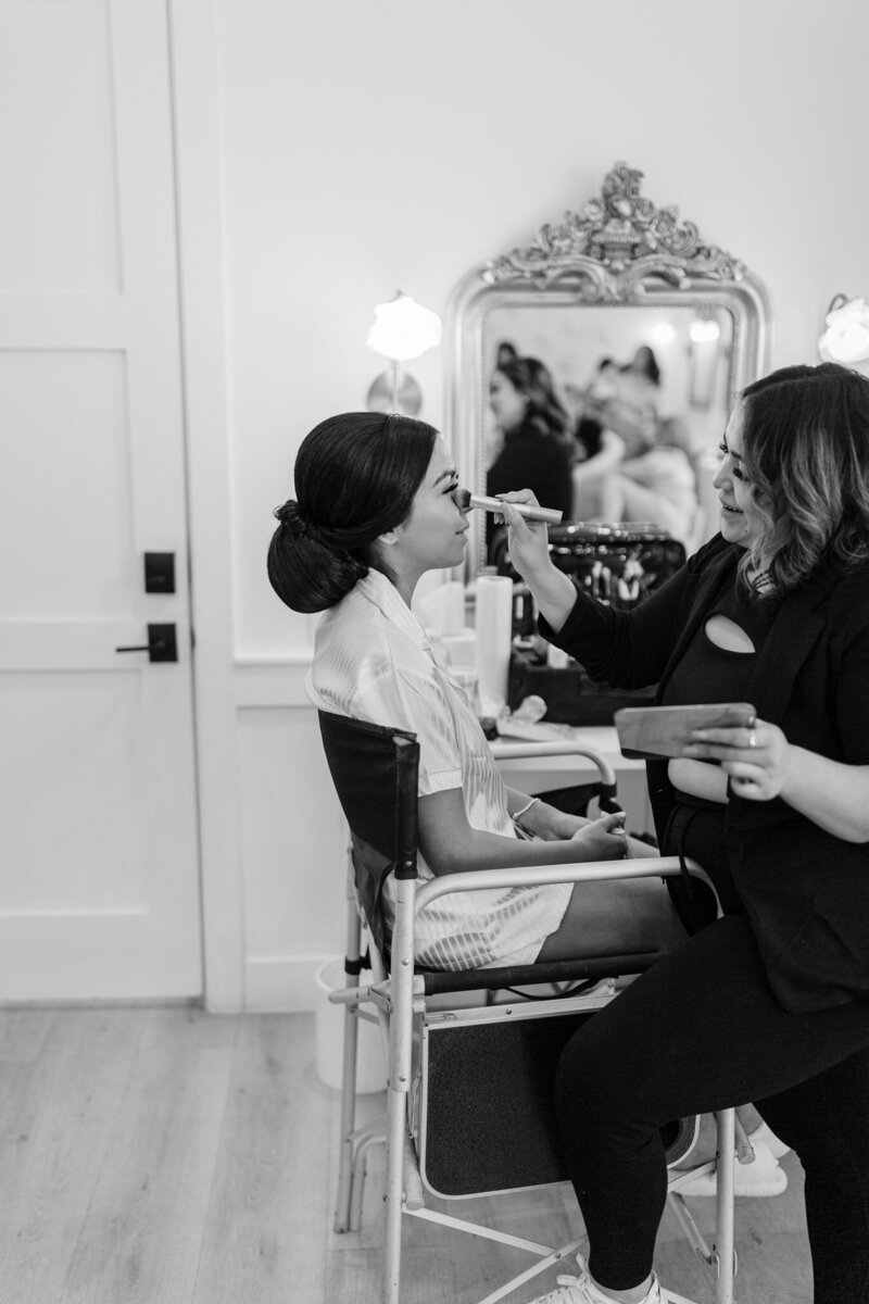 bride getting make-up done