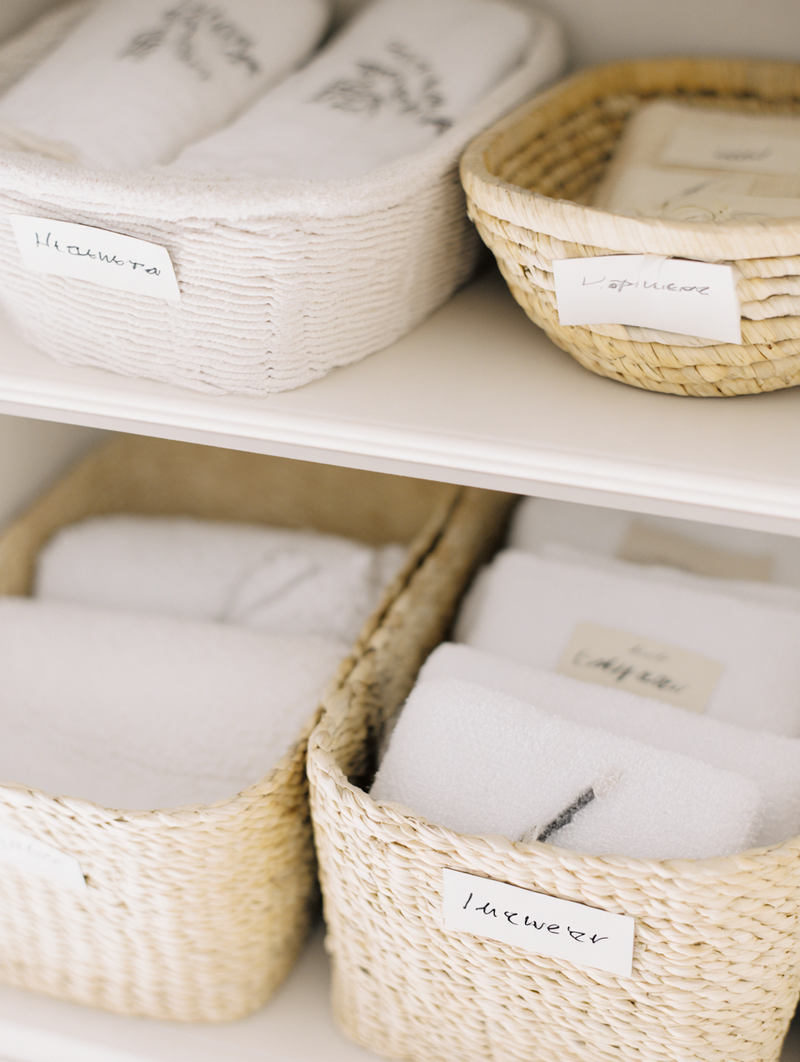 krista5123_close-up_of_labeled_baskets_with_folded_towels_and_c769e260-cb12-4fe4-889c-51a463c5071c_1