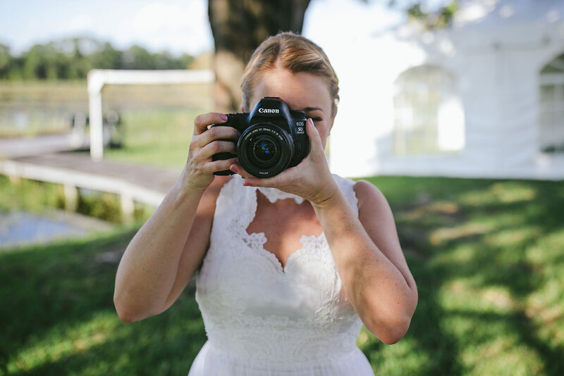 Bride-Photographer-Taking-a-Photo-Wedding-Day