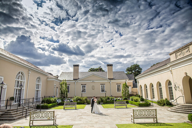 Bride and Groom in Courtyard at Piedmont Driving Club Wedding