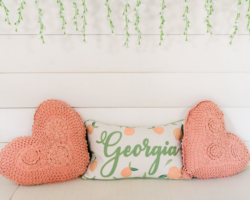 heart shaped pillow and pillow with Georgia written on it
