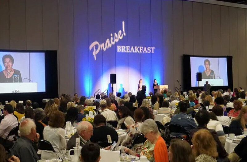 Author and speaker Nita Tin delivering her Lydia Impact Award acceptance speech at the 2023 Scenic City Women’s Network Praise Breakfast in Chattanooga, Tennessee.