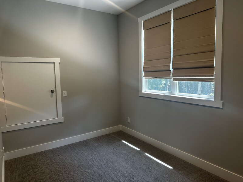 Interior bedroom freshly painted with neutral tones and clean lines