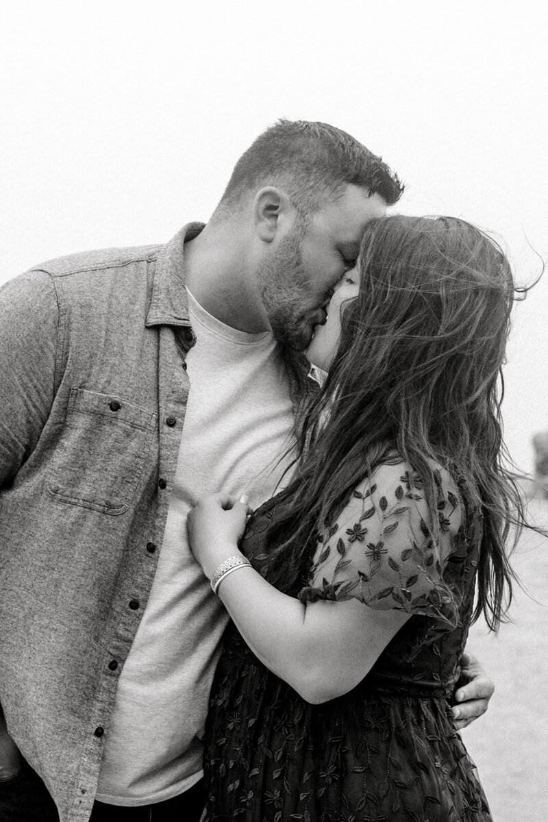 A timeless black and white engagement session capturing a romantic moment in California, photographed by Tiffany Longeway Photography