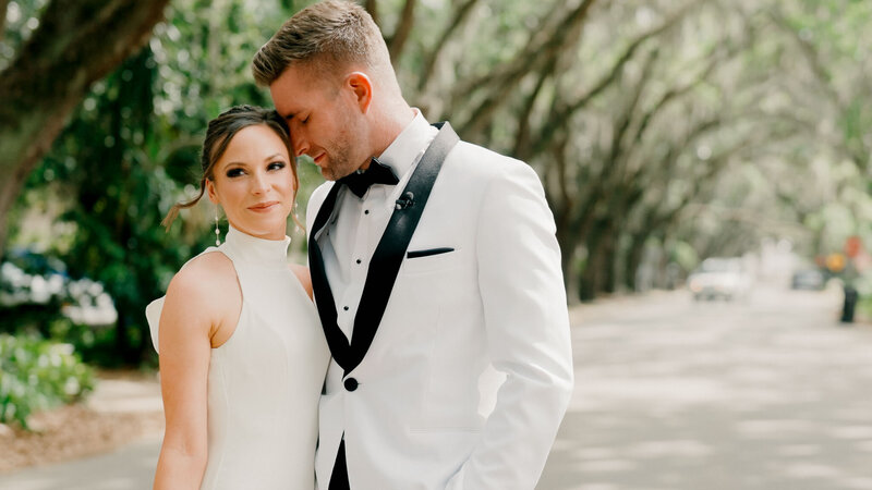 Bride and groom sharing a tender moment, captured by Tyler and Makenzie Films, luxury Florida wedding videographers
