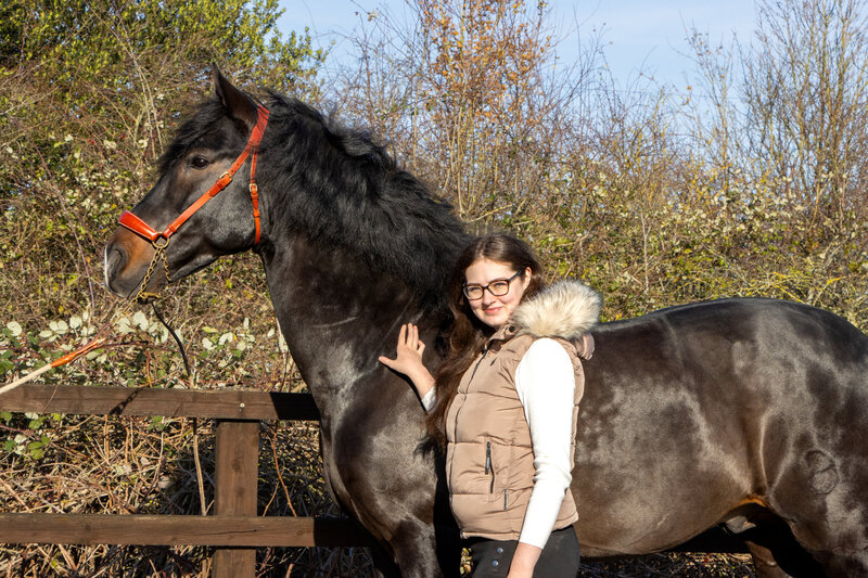 Horse and Woman Standing