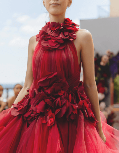 Red floral gown with intricate detail shot by professionals in Chicago.