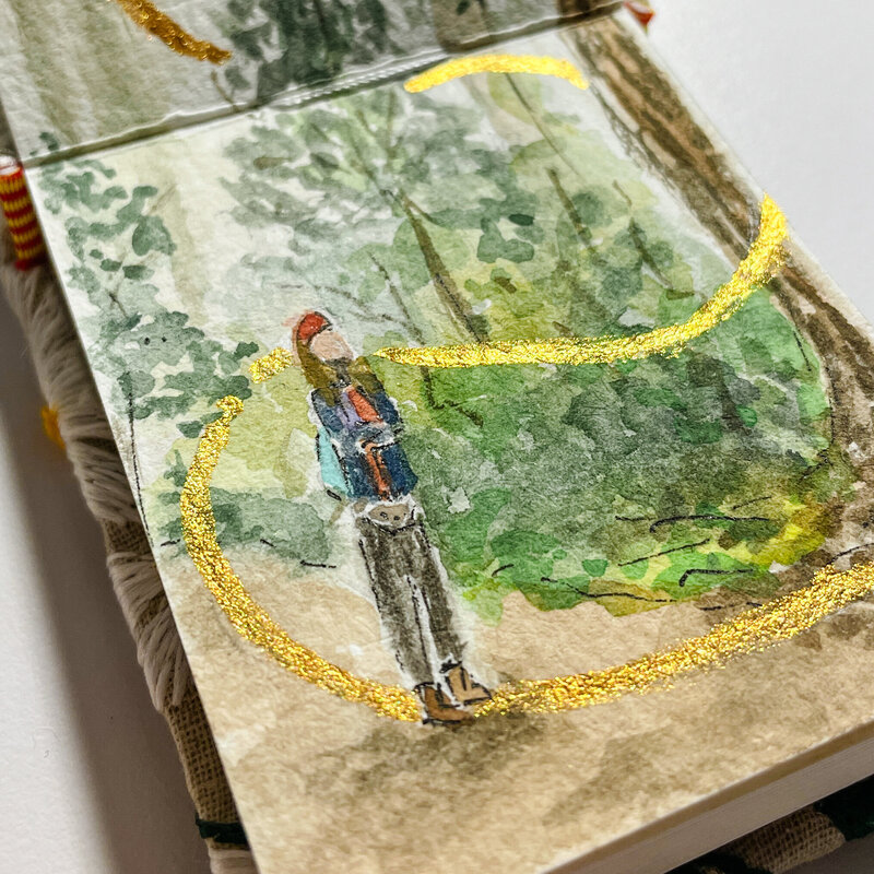 watercolor paints on desk