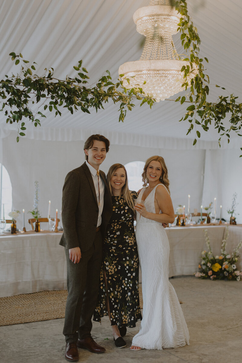 Shelby Donald with newlywed couple at the Cottage at Riverbend in Eagle Idaho, captured by Kylie Morgan Photography