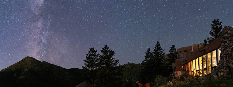The Milkyway  core rises brightly out of the top of a mountain, taken by an adventure luxe elopement photographer who  was traveling with clients in Colorado. 