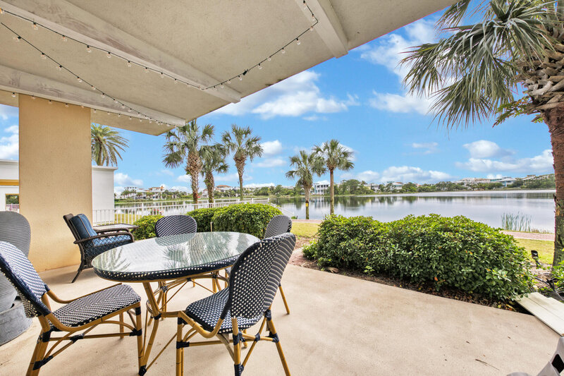 private patio with round dining table and chairs