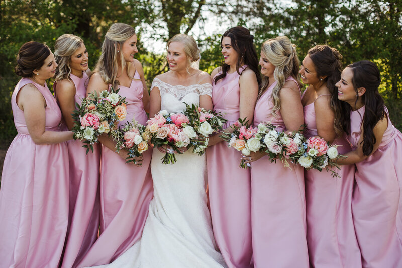 bride and bridesmaids in pink