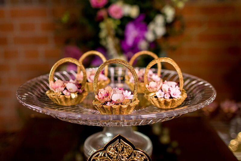 Edible flower basket on a crystal cake stand