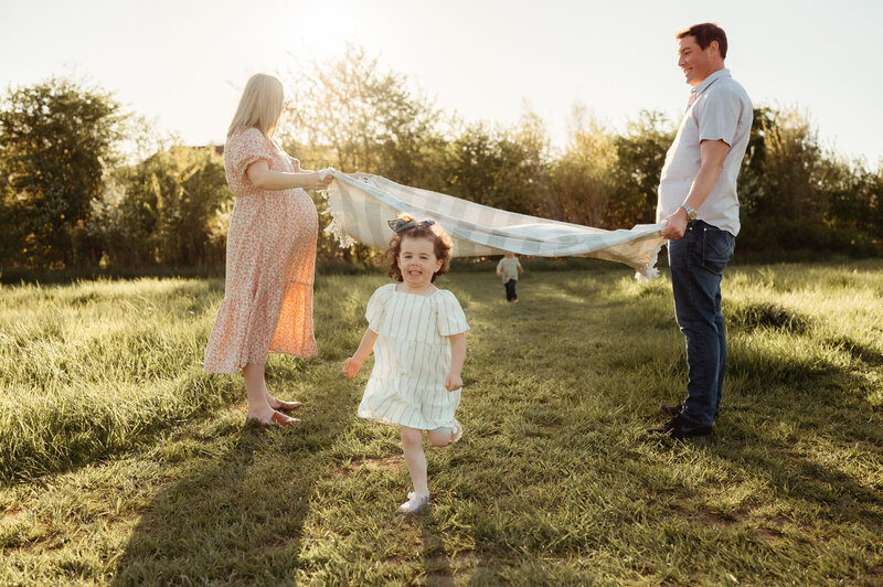 family at the beach maternity