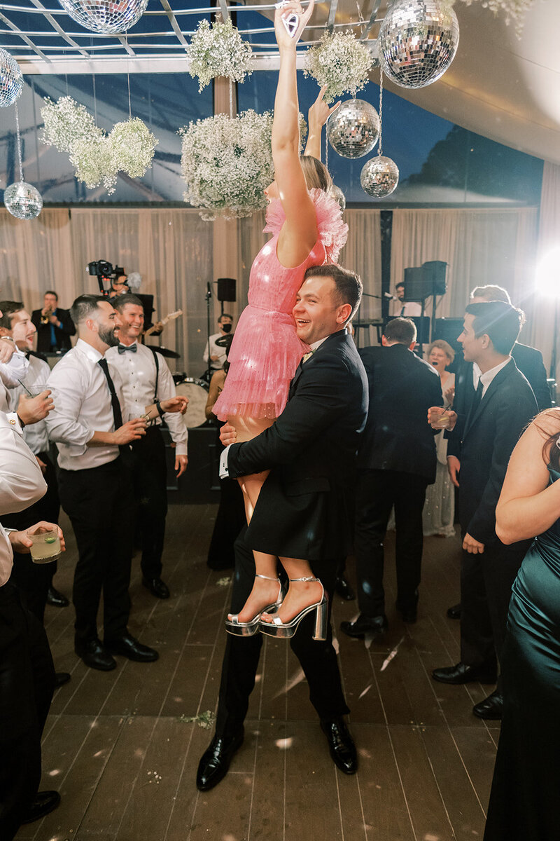 Exuberant and iconic spring wedding with baby’s breath and mirror disco balls at a National historic landmark with a modern all-glass pavilion tent | Fairmount Water Works | Philadelphia PA | Denise Marie Photography | Editorial Wedding Photographer based in Philadelphia PA