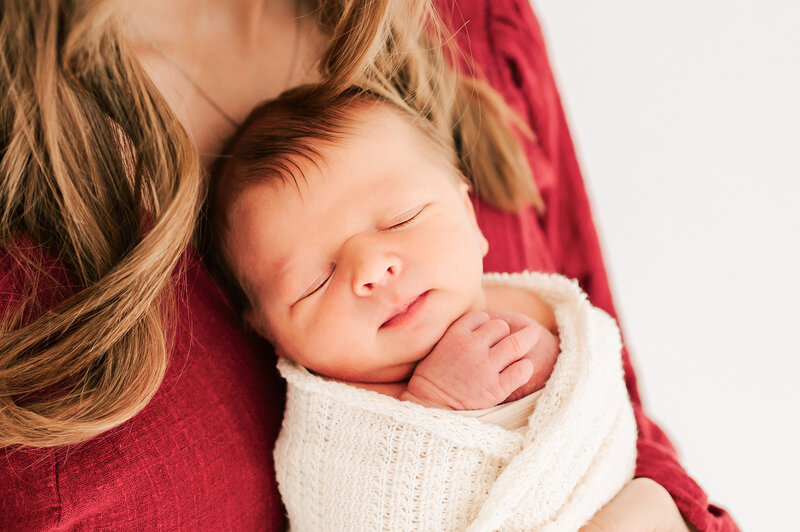 baby boy on mom's chest during Springfield MO newborn photographer Jessica Kennedy of The XO Photography