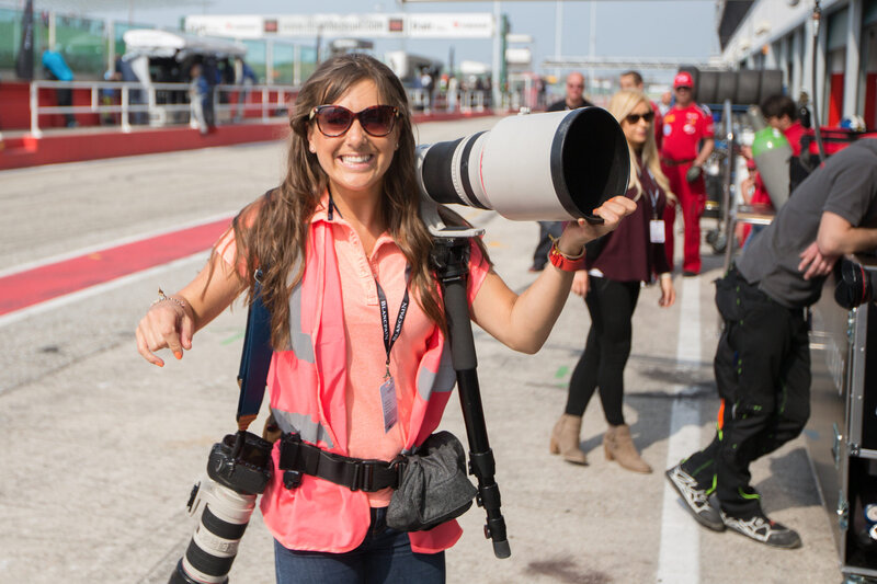 Photographer with telephoto equipment