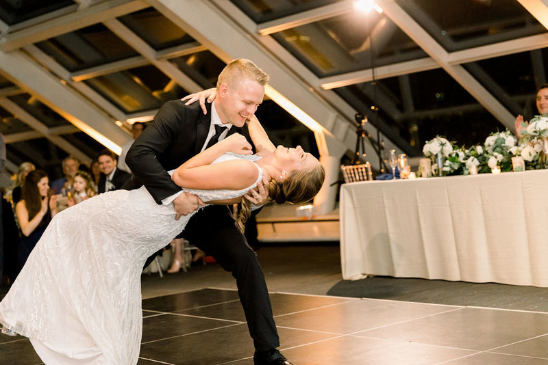 bride dipped at first dance by groom