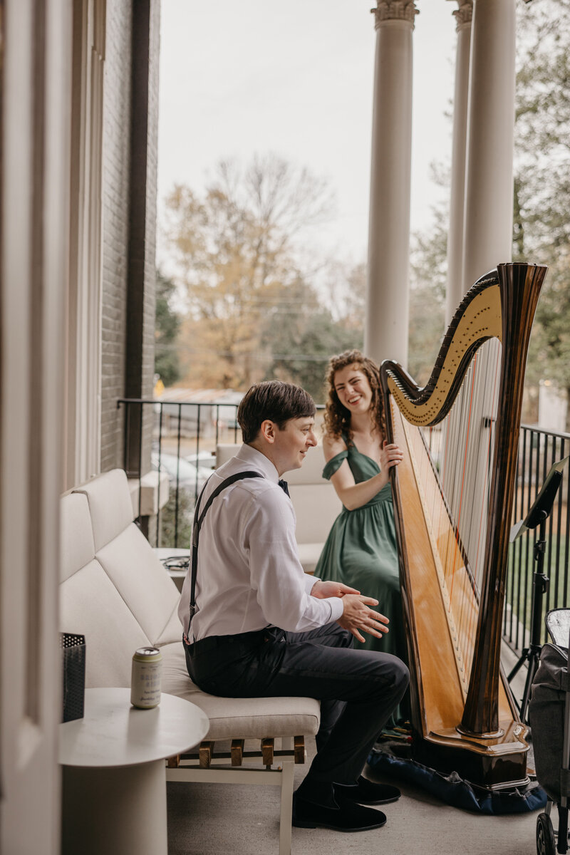 Groom and harpist before a wedding at Heights House Hotel