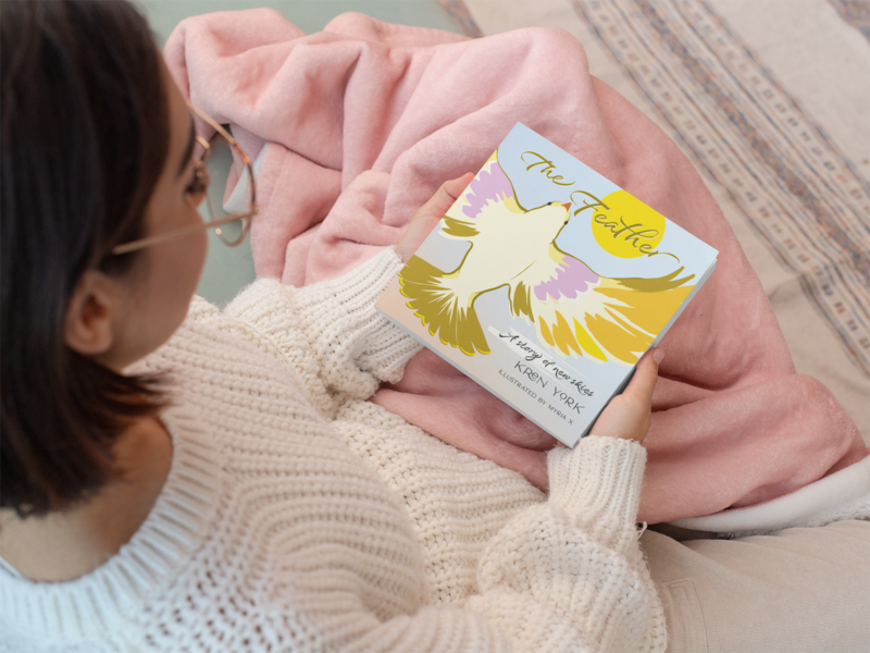 mockup-of-a-short-haired-woman-contemplating-a-squared-book-31043