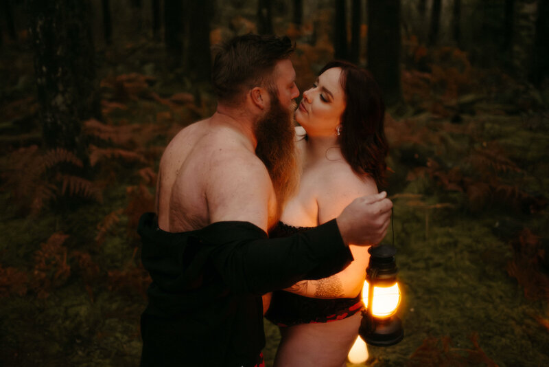 nude girl with babys breath  held in her rolls