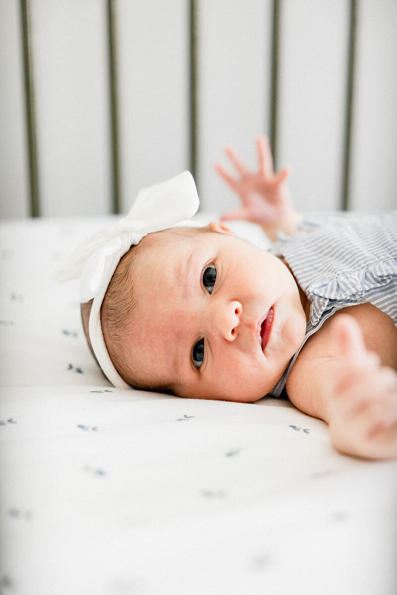 Newborn in crib