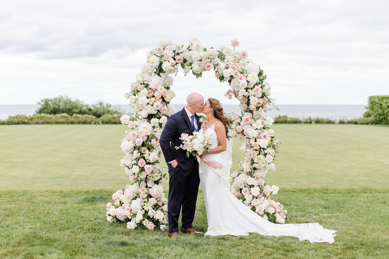 Bride and Groom connecting and holding flowers